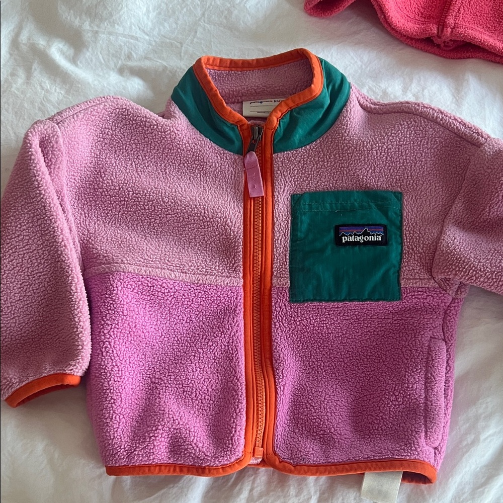 Patagonia Pink Fleece Jacket with Green Pocket and Orange Trim